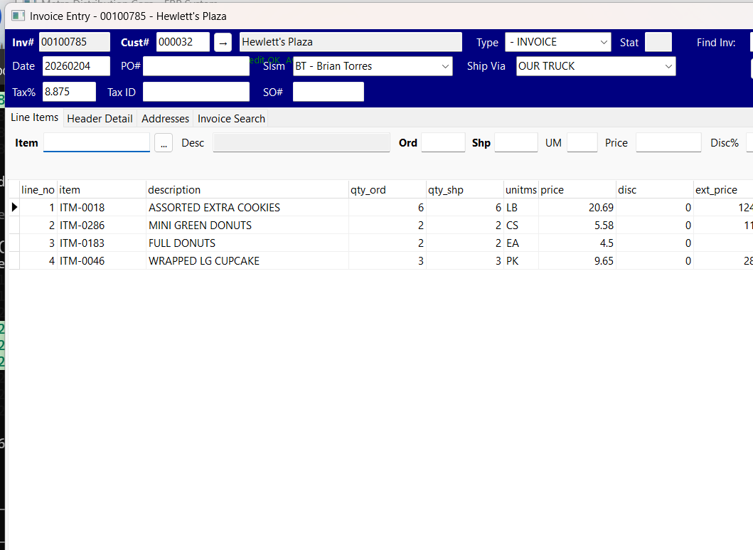 Invoice entry form with line items, payment methods, and audit trail